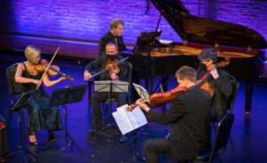 Tracy, Krista, Rohan, Peter, David and Randy perform at the JMAC BrickBox Theatre